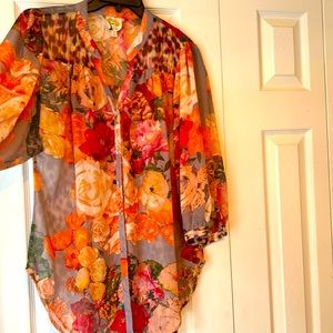 Multi colored flowers with cheetah print blouse, 100% polyester, loose wavy fit!